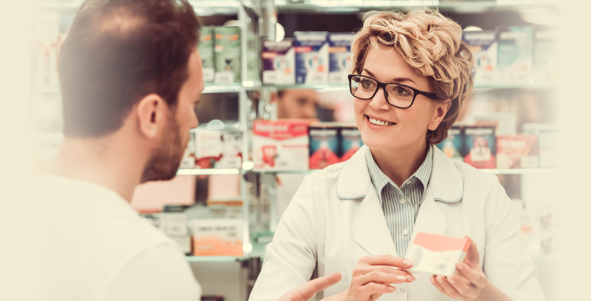 pharmacist talking to a customer